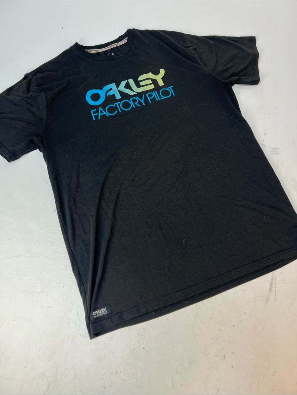 Oakley Black Tee with Blue and Lime 'Factory Pilot' Logo